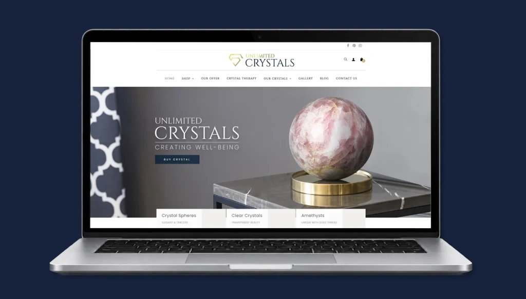 Unlimited Crystals PrestaShop ecommerce website displayed on a laptop, featuring a rose quartz sphere and the store's homepage design.